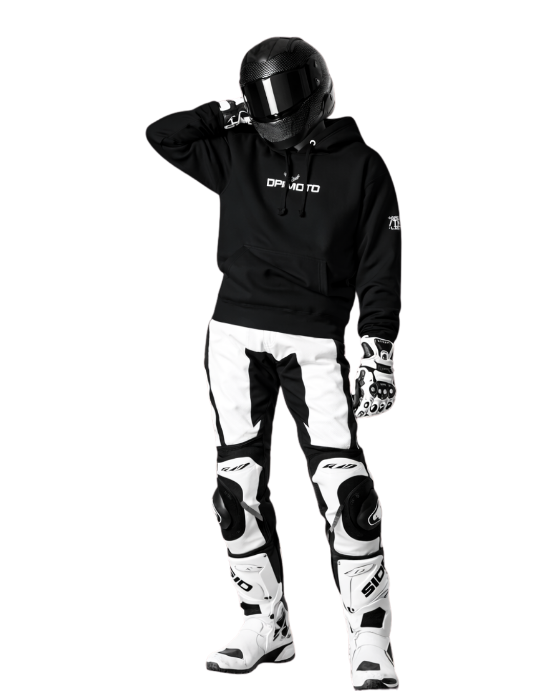 Motorcycle rider wearing black DPMOTOS hoodie, full-face helmet and white racing pants, standing in dark studio, clean motorsport streetwear look focused on control and performance.