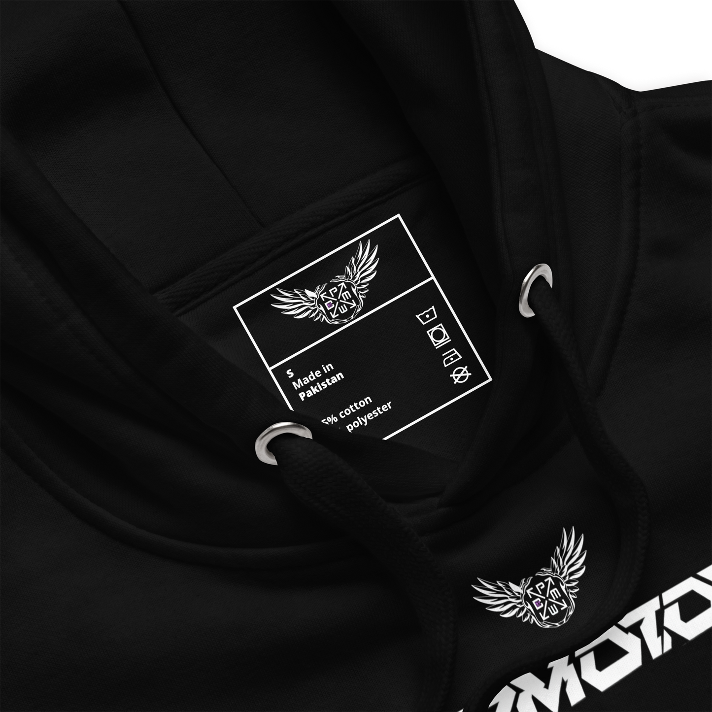 Close-up of DPMOTOS hoodie interior label showing brand logo, size tag, and material details, minimalist streetwear craftsmanship inspired by motorsport performance.